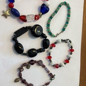 This is a lot of 5 beautiful stone and glasss beaded Artisan bracelets